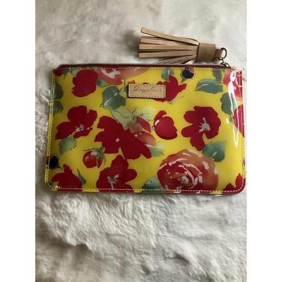NWOT DOONEY & BOURKE VINYL FLOWER WRISTLET CLUTCH POUCH - Picture 1 of 9